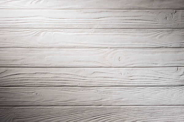 Wooden fence planks background painted in white