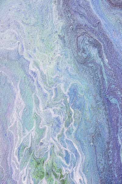 close up of abstract background with light blue and purple acrylic paint 