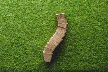 top view of arranged stack of flower pots on grass clipart