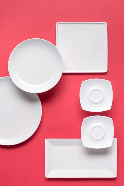 Composition Various White Plates Red Background — Stock Photo, Image