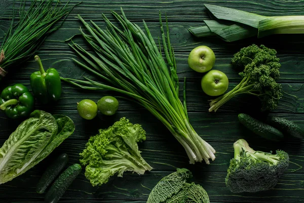 Top view of green onion, apples and broccoli on wooden table, healthy eating concept — Stock Image Top View Green Onion Apples Broccoli Wooden Table Healthy Eating Stock Photo