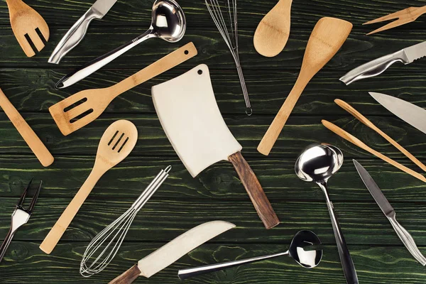 top view of kitchen utensils on wooden table