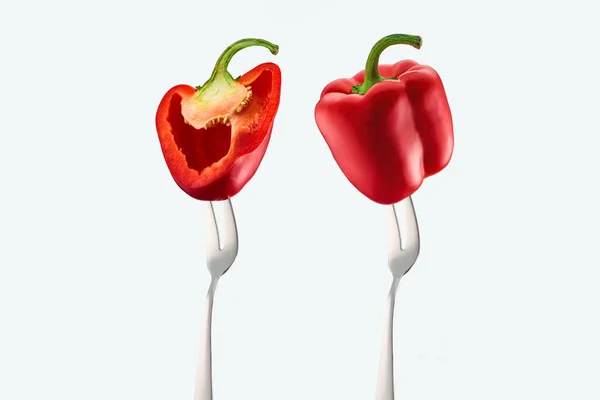 Cut Whole Red Bell Peppers Forks Isolated White — Free Stock Photo