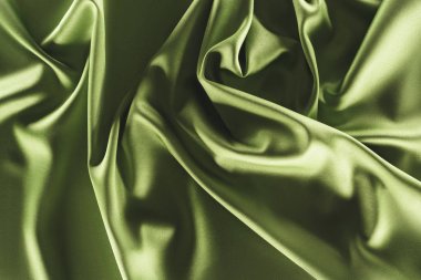 close up view of elegant green silk cloth as backdrop clipart
