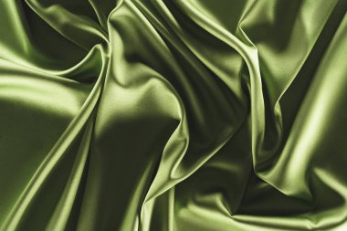 close up view of elegant green silk cloth as backdrop clipart