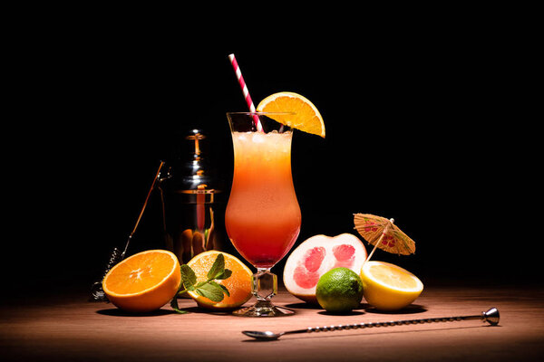 alcohol cocktail with orange juice on wooden tabletop