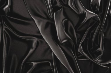 full frame of black elegant silk cloth as background clipart