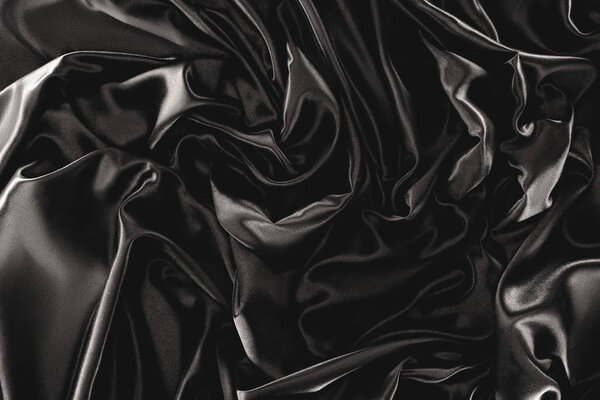 full frame of black elegant silk cloth as background