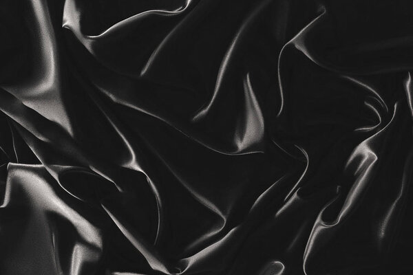 полная рамка из черной элегантной шелковой ткани в качестве фона

