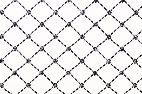 full frame of white fabric with blue ornament backdrop