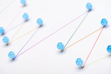 close up view of colorful connected drawn lines with pins, connection concept clipart