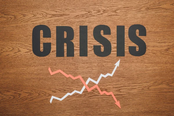 Top View Black Paper Cut Word Crisis Increase Recession Arrow — Stok Foto