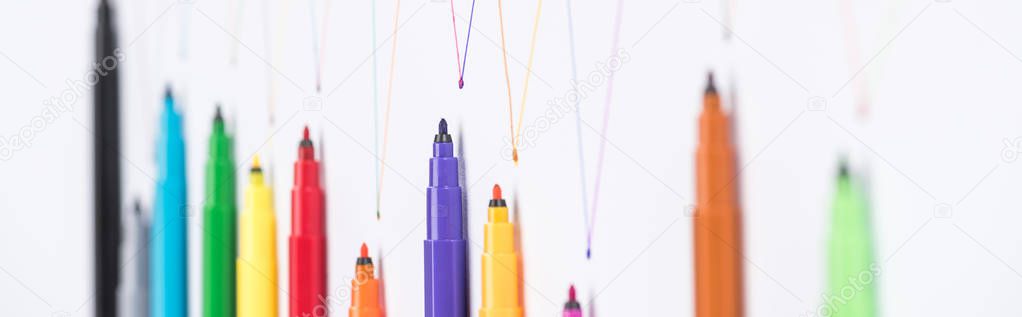 top view of felt-tip pens on white background with connected drawn lines, connection and communication concept