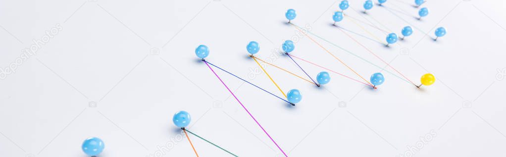panoramic shot of colorful connected drawn lines with pins, connection and leadership concept