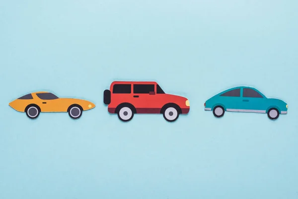 Top View Paper Cut Various Cars Blue Background — Stock Photo, Image