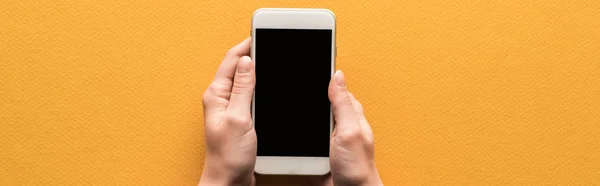 Cropped View Woman Holding Smartphone Blank Screen Orange Background Panoramic — Stock Photo, Image