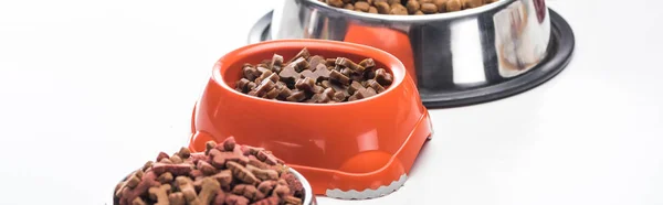Assorted Dry Pet Food Bowls Isolated White Panoramic Shot — Stock Photo, Image