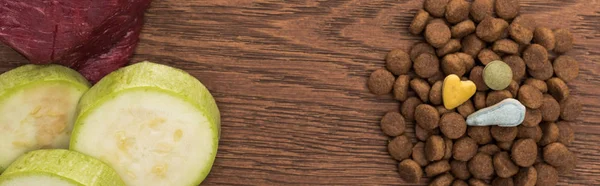 Top View Raw Meet Zucchini Vitamins Dry Pet Food Wooden — Stock Photo, Image