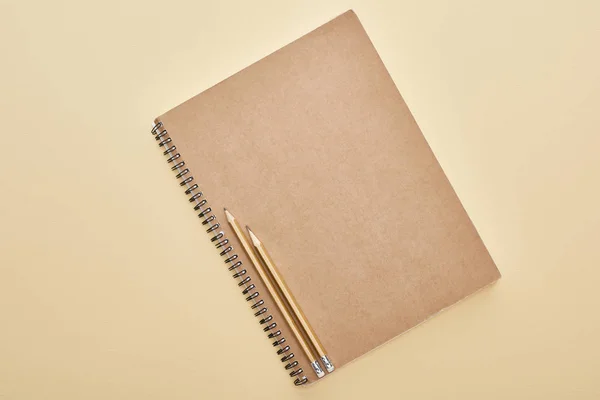 Top View Paper Blank Notebook Pencils Beige Background — Stock Photo, Image