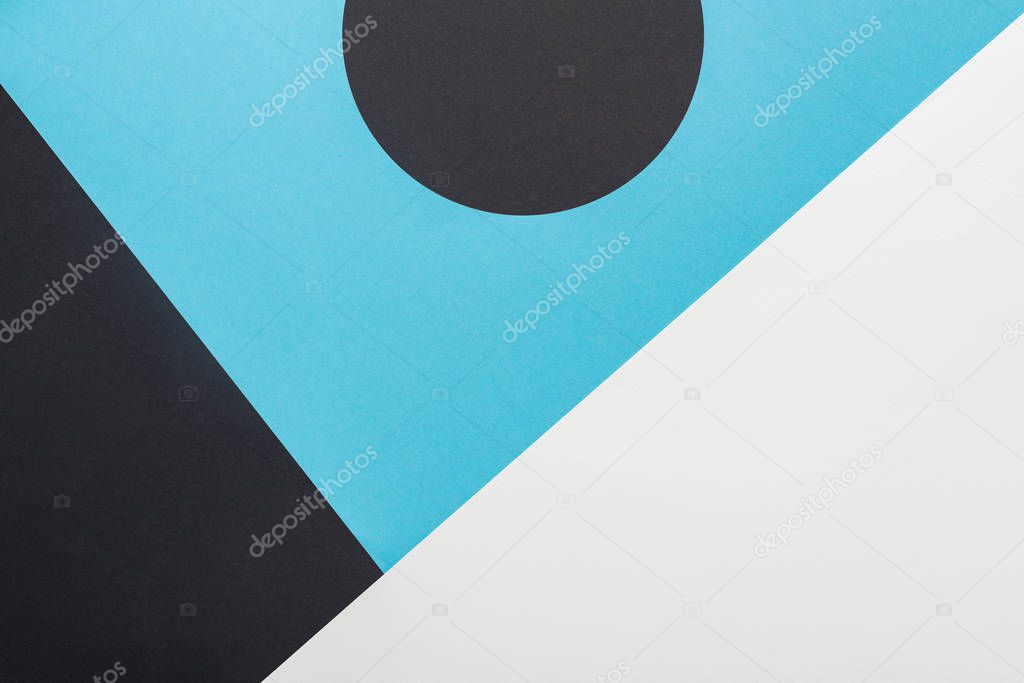 top view of black, blue and white abstract geometric background