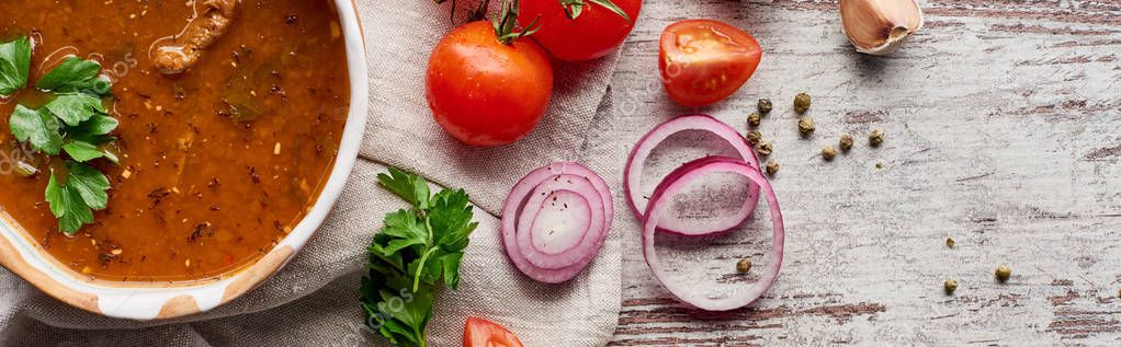 Top view of soup kharcho with cilantro and vegetables on wooden table, panoramic shot — Stock Image Top View Soup Kharcho Cilantro Vegetables Wooden Table Panoramic Shot Stock Image