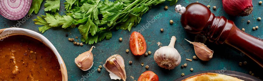 Top view of soup kharcho with spices and vegetables on textured green background, panoramic shot — Stock Image Top View Soup Kharcho Spices Vegetables Textured Green Background Panoramic Royalty Free Stock Photos