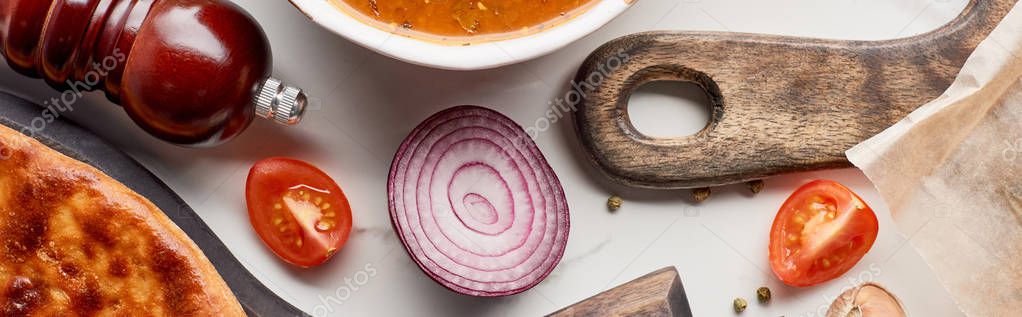 Imereti khachapuri, soup kharcho and vegetables on white background, panoramic shot — Stock Image Imereti Khachapuri Soup Kharcho Vegetables White Background Panoramic Shot Royalty Free Stock Images