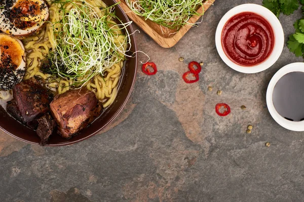 Top View Spicy Meat Ramen Fresh Ingredients Sauces Stone Surface — Stock Photo, Image