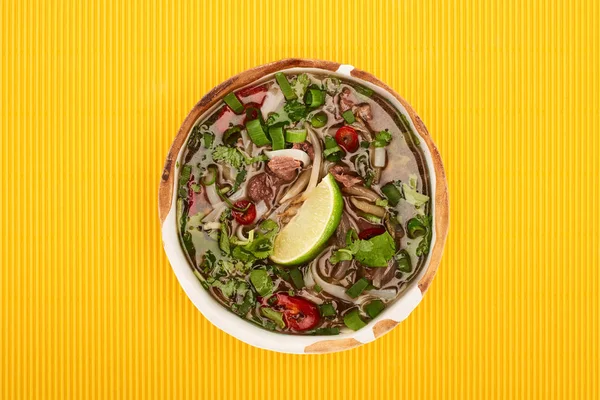 Top View Pho Bowl Yellow Textured Background — ストック写真