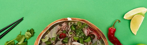 Top View Pho Bowl Chopsticks Lime Chili Coriander Green Background — ストック写真