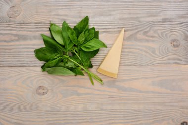 top view of pesto sauce raw ingredients on wooden table clipart
