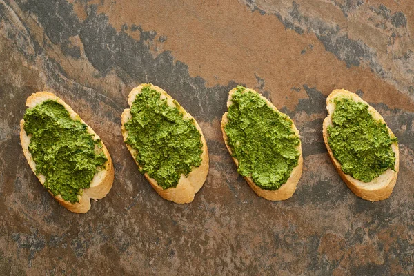 Flat Lay Baguette Slices Delicious Pesto Sauce Stone Surface — Stock Photo, Image