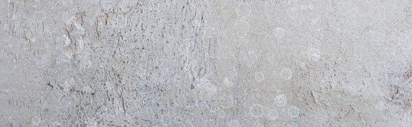 вид сверху на текстурированную серую поверхность с копировальным пространством, панорамный снимок
