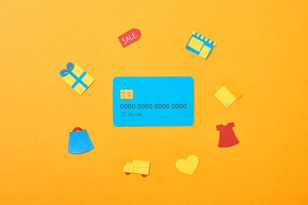 Top View Blue Credit Card Template Shopping Icons Isolated Orange — Stock Photo, Image