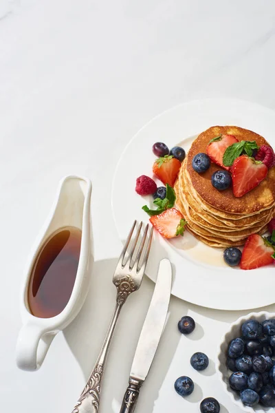 Top View Delicious Pancakes Maple Syrup Blueberries Strawberries Plate Fork — Stock Photo, Image