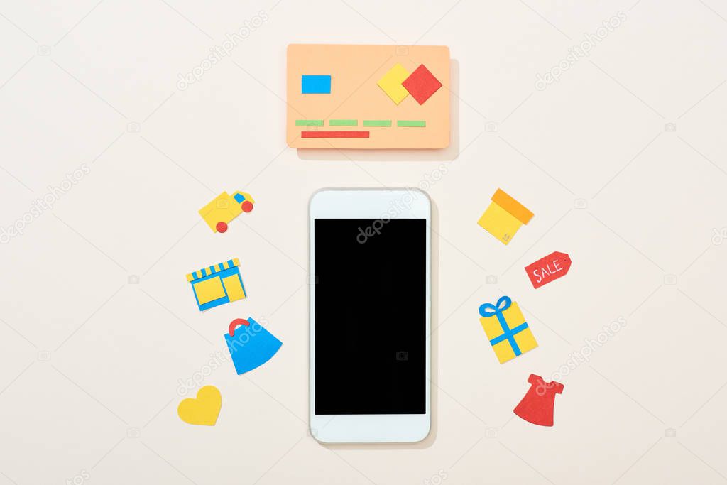 top view of credit card template near icons and smartphone on white background