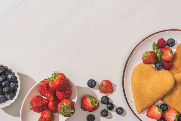 Top View Tasty Heart Shaped Pancakes Berries Mint White Background — Stock Photo, Image