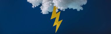 white fluffy cloud made of cotton wool with lightning isolated on dark blue, panoramic shot clipart