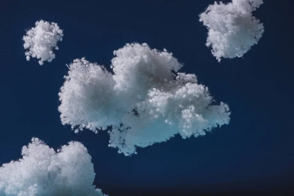 Nubes Esponjosas Blancas Hechas Algodón Aislado Azul Oscuro — Foto de Stock