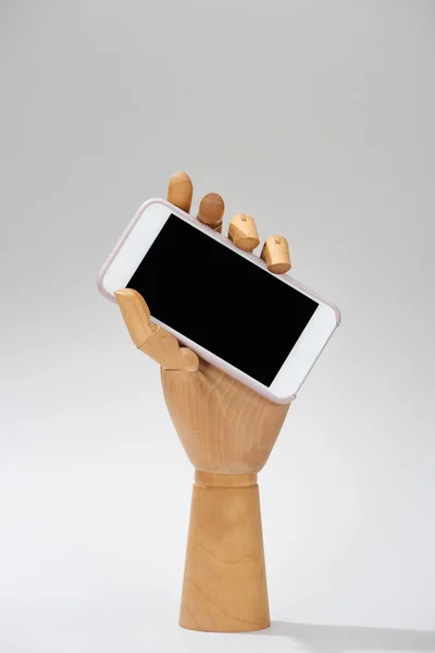 Houten Hand Van Pop Met Smartphone Met Blanco Scherm Grijze — Stockfoto