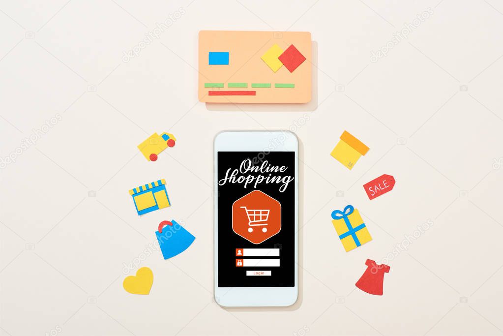 top view of credit card template near icons and smartphone with online shopping illustration on white background