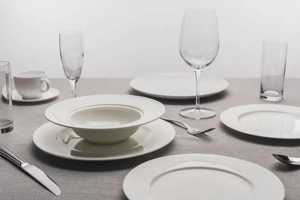 Dishware Transparent Glasses Tablecloth Grey Background — 스톡 사진