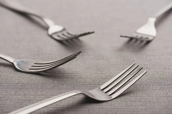 Selective Focus Shiny Forks Grey Tablecloth — Stock Photo, Image