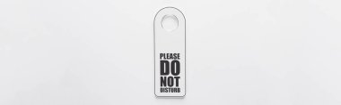 top view of please do no disturb sign on white background, panoramic shot clipart