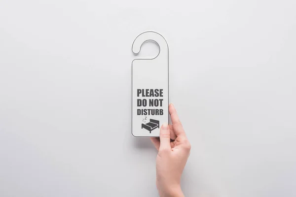 Cropped View Woman Holding Please Disturb Sign White Background — 스톡 사진