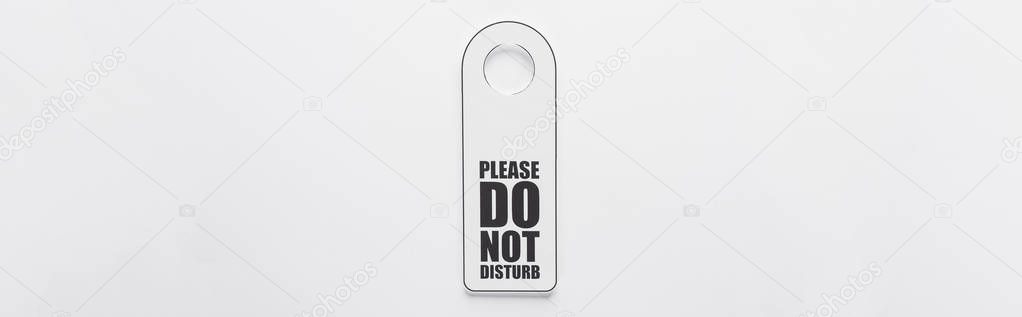 top view of please do no disturb sign on white background, panoramic shot