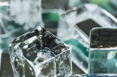 close up view of melting transparent clear square ice cubes clipart