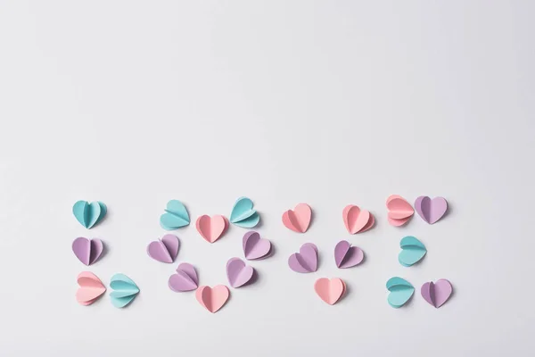 Top View Love Lettering Made Colorful Paper Hearts White Background — Stock Photo, Image