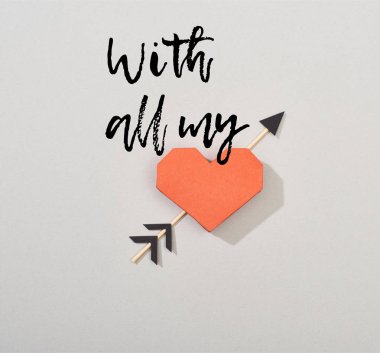 Top view of decorative paper heart with arrow on grey background with all my lettering clipart