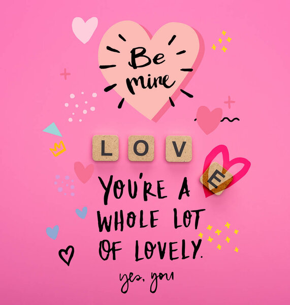 top view of love lettering on wooden cubes on pink background with be mine and you are a whole lot of lovely illustration